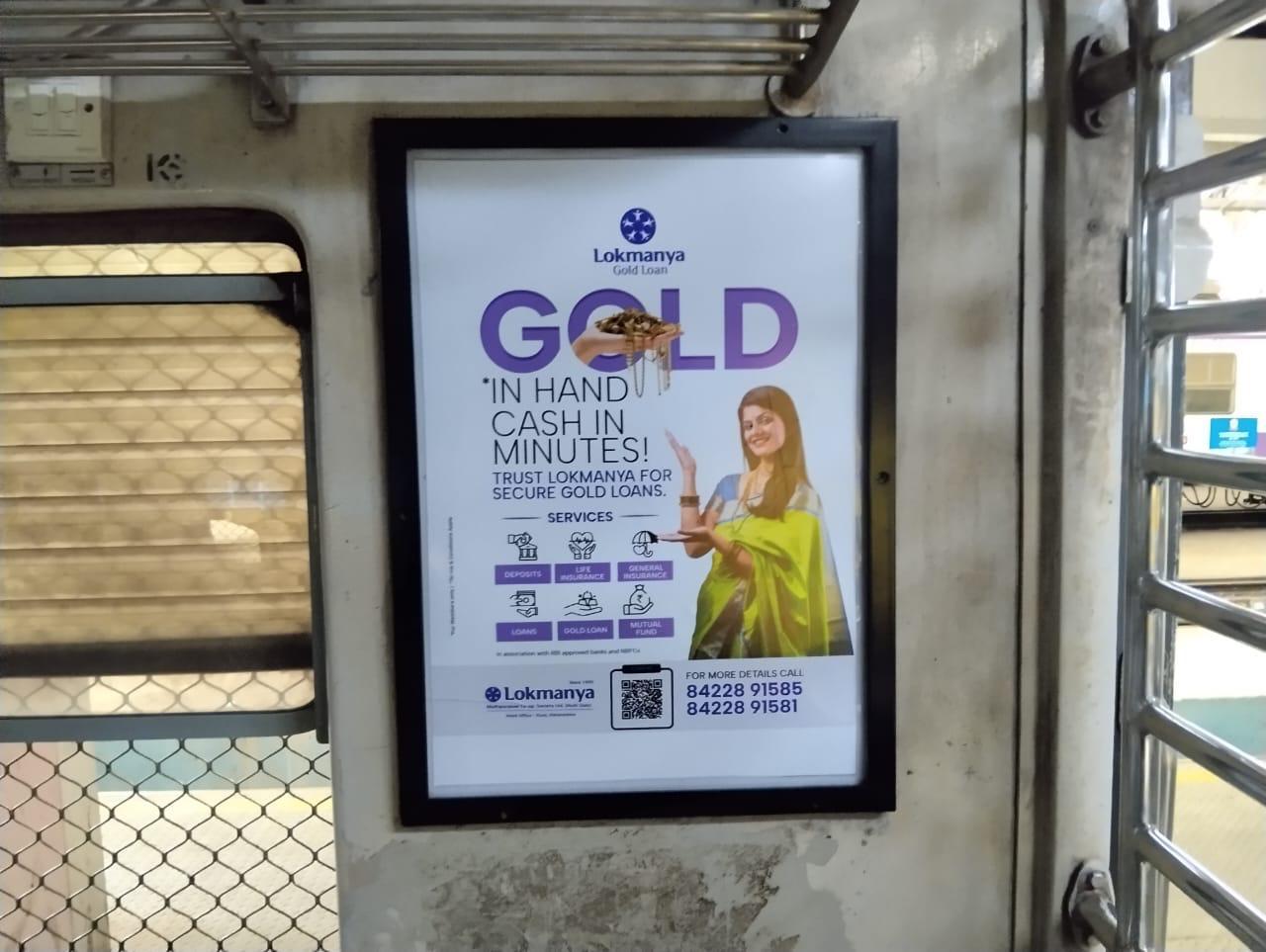 Inside train window panel ad inside Mumbai suburban train coach