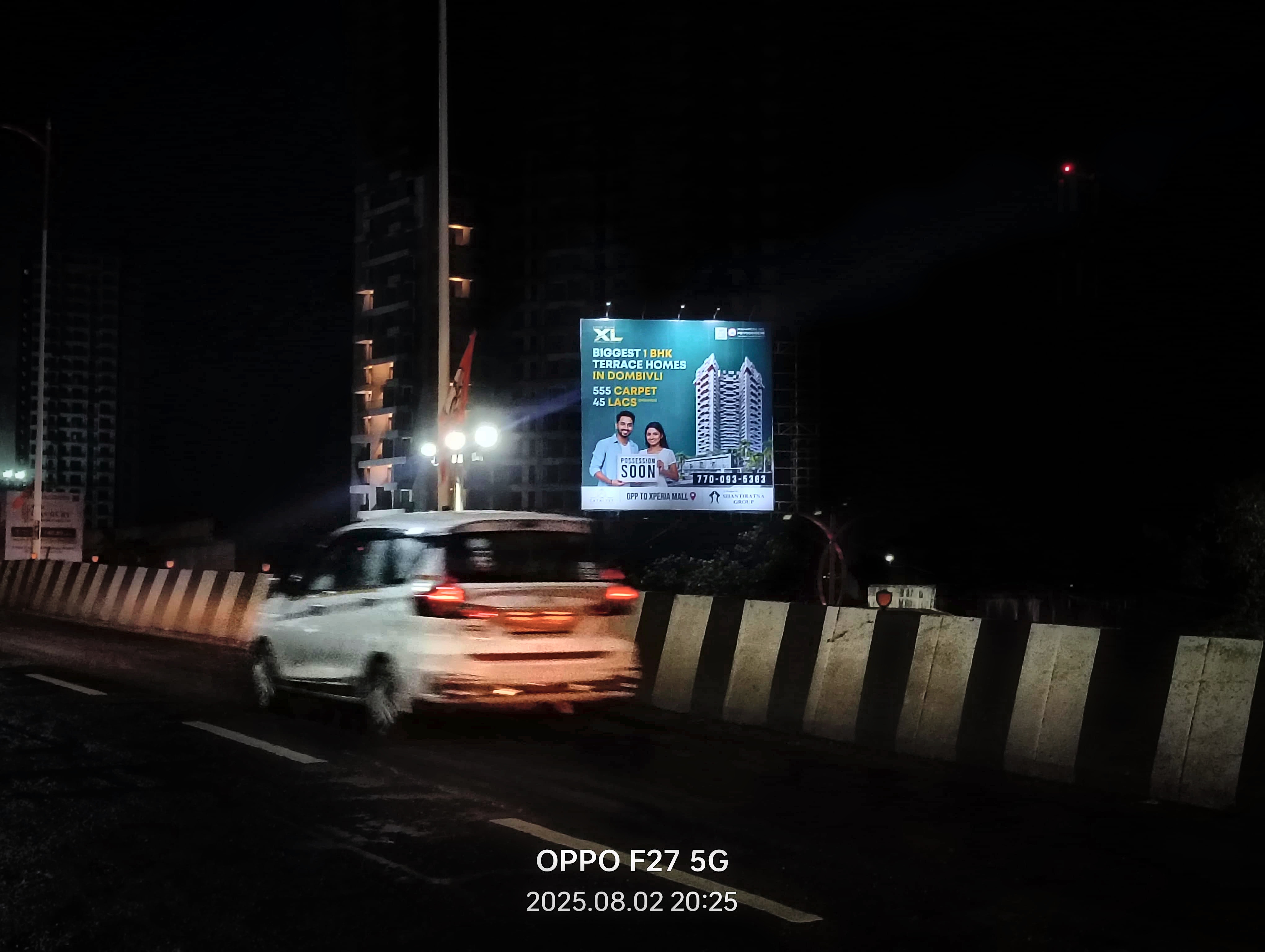 Night-illuminated highway billboard